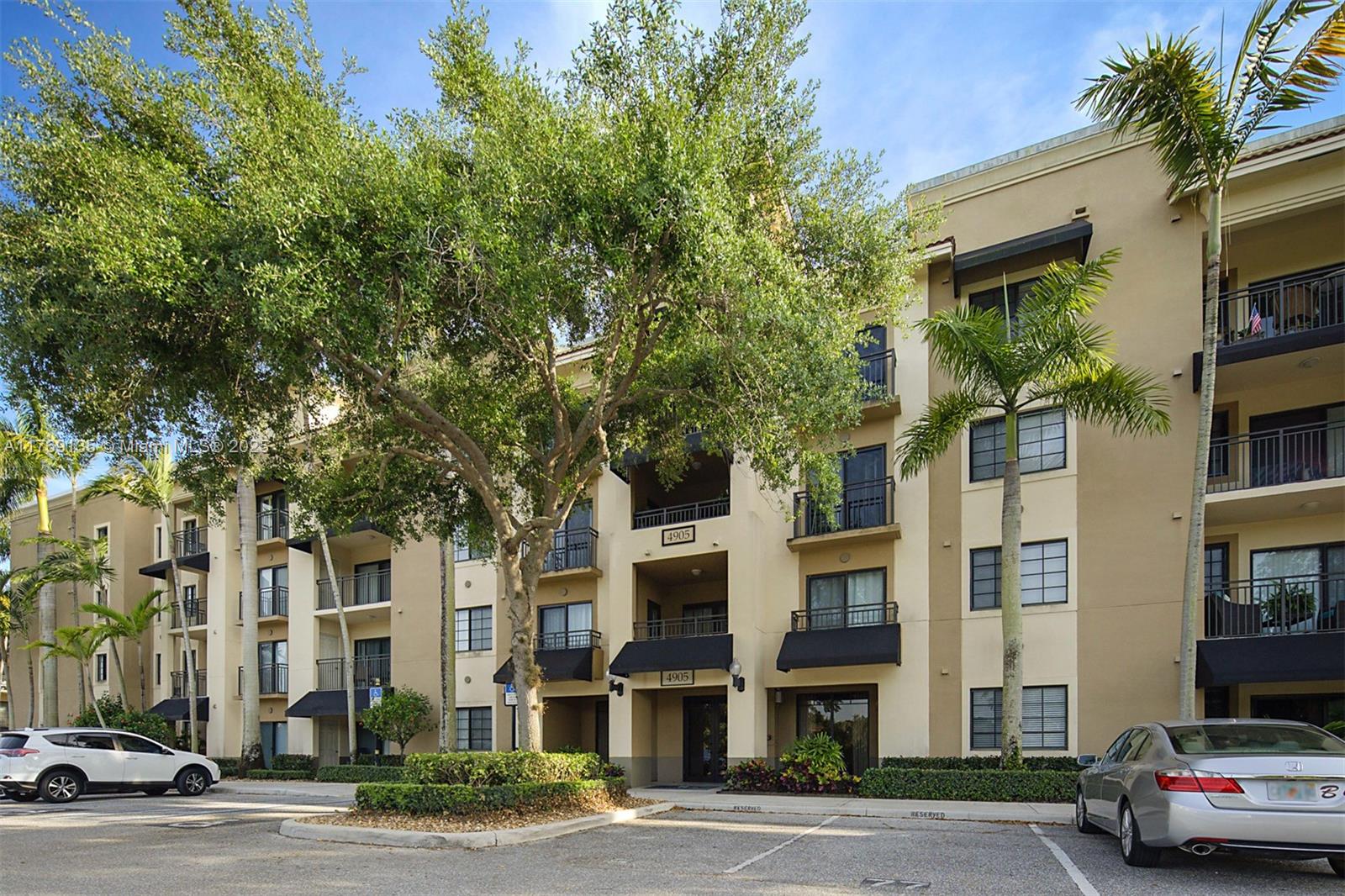 Exquisite 3/2, condo located in the heart of Palm Beach Gardens, offering an elevated lifestyle with top-floor living & beautiful features. The top floor has extra-high ceilings. As you enter, you'll appreciate the natural light & bright atmosphere created by the hurricane impact windows & doors leading out to the patio which overlooks the serene lake. The perfect spot for morning coffee or evening relaxation. The Kitchen was remodeled within the past couple of years. Newer refrigerator, washer/dryer & new A/C. The master suite is a true retreat, featuring a garden tub. This condo offers not just a home but a lifestyle. Enjoy the beautiful clubhouse with a 24 hour fitness center, heated pool, hot tub, pickleball/tennis & community activities. Just steps to dining, shopping, & so much more.