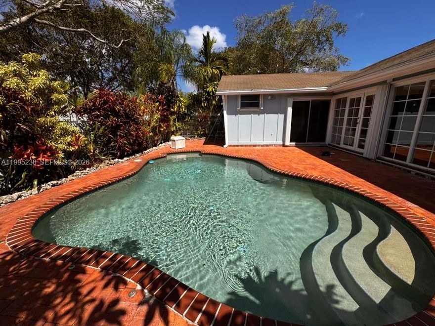 Corner home in desirable Country Walk featuring 3 bedrooms and 2 bathrooms, offering privacy and extra outdoor space. This well-maintained property includes a private pool, fully fenced yard, and a spacious layout ideal for both everyday living and entertaining. The home boasts a comfortable family room, an updated kitchen, and multiple cosmetic upgrades including new flooring and fresh interior paint, creating a clean and modern feel throughout.

Additional highlights include a large garage with washer and dryer, ample storage, and functional living areas filled with natural light. No special assessments, providing added peace of mind for buyers.

Located in a vibrant and well-established community, residents enjoy access to a clubhouse, gym, tennis courts, and a variety of activities for both children and adults. Country Walk is known for its family-friendly environment, tree-lined streets, and convenient location close to shopping, dining, and top-rated schools.

A fantastic opportunity to own a move-in ready home with great amenities in one of the area’s most sought-after neighborhoods.