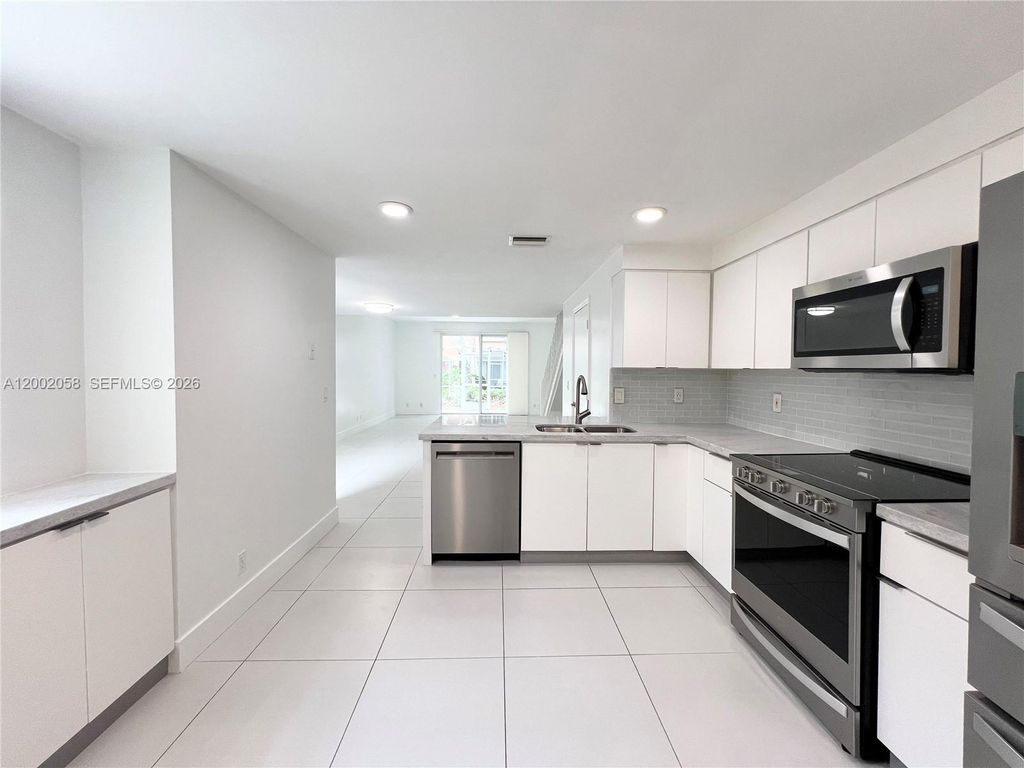 Photo of 1524 Coronado Rd, Weston, FL 33327 (MLS # A12002058)