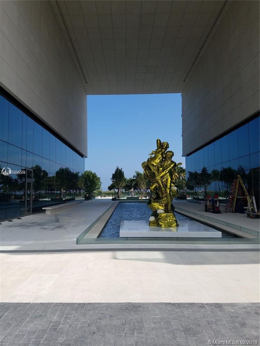 PRICE REDUCED!!!!! Seller is taking into consideration that unit has to be finished.  Bring in the decorator and make  this amazing flow-thru Residence, your client's home.    3 bedrooms 4.5 bathrooms plus den.  Assigned parking and valet service.  Unit comes with a storage space. Only new building in Bal Harbour with Jeff Koons installations.  Be one of the first residents to live in this one of a kind development with 500 ft of beachfront. Enjoy  direct ocean, bay and city views along with wonderful state of the art amenities. 24hrs concierge, Residents only  private restaurant, beach /pool service, tennis, gym , spa, kids playroom  and private movie theater. All within walking distance to the world renowned Bal Harbour Shops and restaurants.  Easy to show!!!