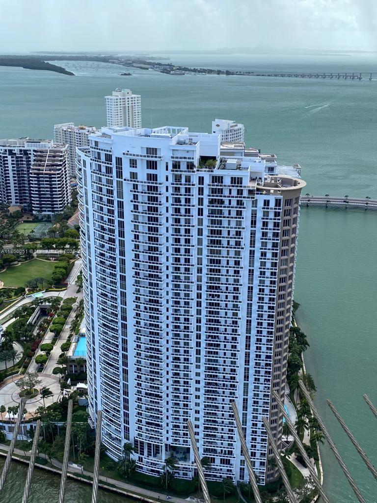 Experience luxury island living in the secluded Brickell Key with stunning views of Miami's skyline and BiscayneBay. This residence features a gourmet kitchen equipped with Miele and Sub-Zero stainless steel appliances andgranite countertops. Enjoy marble flooring throughout, a glass-enclosed shower, a functional closet system, roll-upshades, and a wrap-around balcony. State-of-the-art amenities are included. AVAILABLE 09/15/2025.