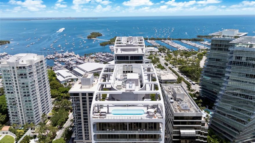 Experience modern living at Mr. C Tigertail Residences in Coconut Grove. This elegant 3 bed, 3.5 bath corner unit offers 1,811 sf of light-filled interiors and a 438 sf wraparound balcony with panoramic city and Grove views. Features include 10 ft ceilings, floor-to-ceiling windows, porcelain floors, solid wood doors, and custom Italkraft kitchen with Italian cabinetry, Wolf & Sub-Zero appliances, and quartz countertops. Amenities include valet plus two covered parking spaces, rooftop and lap pools, cabanas, towel service, and fitness center with yoga and Pilates.
