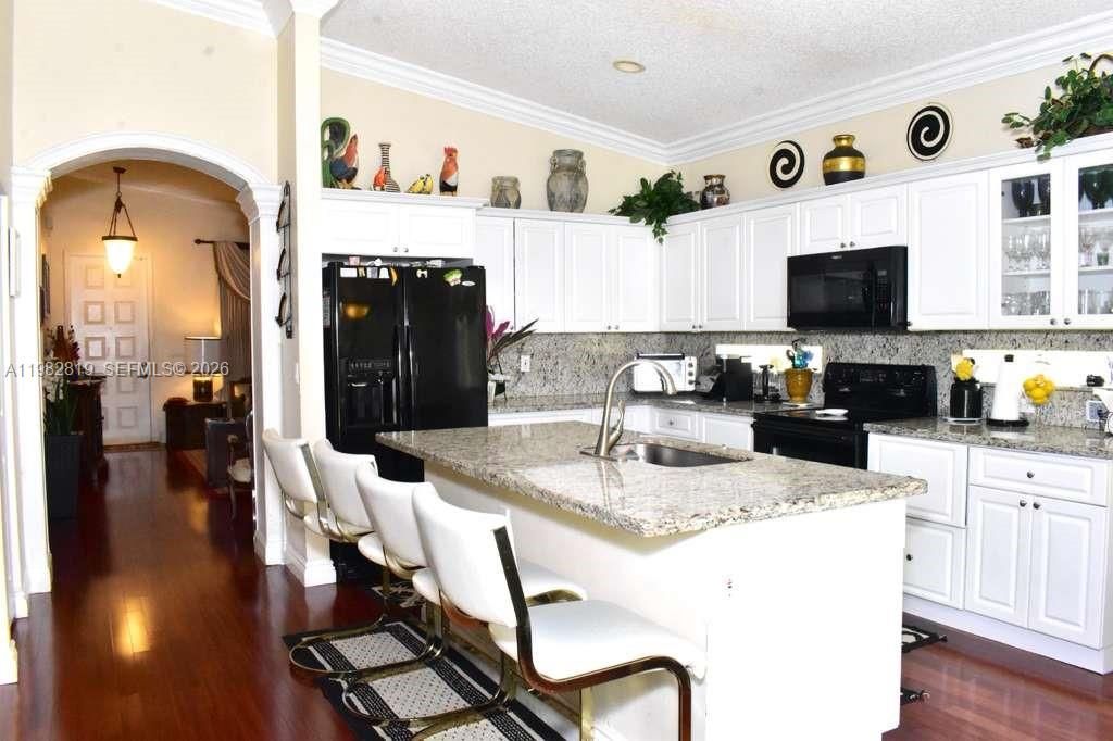 Photo of 16319 SW 11th St, Pembroke Pines, FL 33027 (MLS # A11982819)