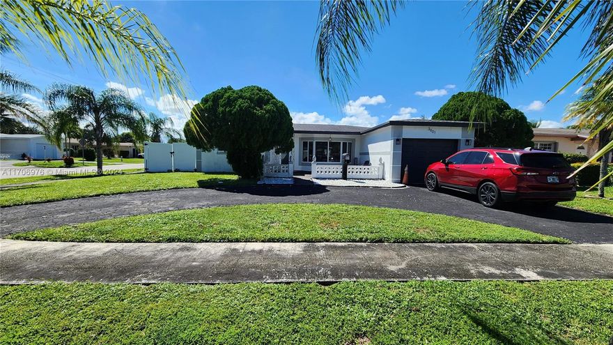 Discover modern luxury and family comfort in this fully renovated 3-bedroom, 2-bathroom home in Lauderdale Lakes. Situated on a spacious, fully fenced corner lot, this property offers style, convenience, and recreation. Inside, the open-concept design features quartzite countertops and Samsung smart appliances in the kitchen. Updated bathrooms include LED mirrors and a spa-like body shower panel in the master bath. Outside, enjoy a heated inground pool, private yard, and oversized garage with a laundry area. Recent upgrades like a 3-year-old AC ensure comfort year-round. Located in a quiet, family-friendly neighborhood near shopping, parks, and highways, this move-in-ready gem combines high-end features with everyday practicality. Schedule your tour today!