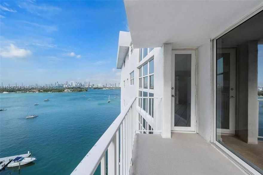 Priced to allow for updates. Enjoy sunrises & sunsets from this oversized 2 bed 1.5 bath located in the West Ave area. Walking distance to Lincoln Rd, Beach & Whole Foods. This condo features an updated kitchen with granite counters that open to living/dining area. Spacious primary bedroom with two walk-in-closets, tiled throughout, and new hi-impact floor to ceiling windows. The building features a new lobby and hallways, 24 hr doorman, deeded parking space, heated pool, gym, storage closet, boat dock and much more. Must see!