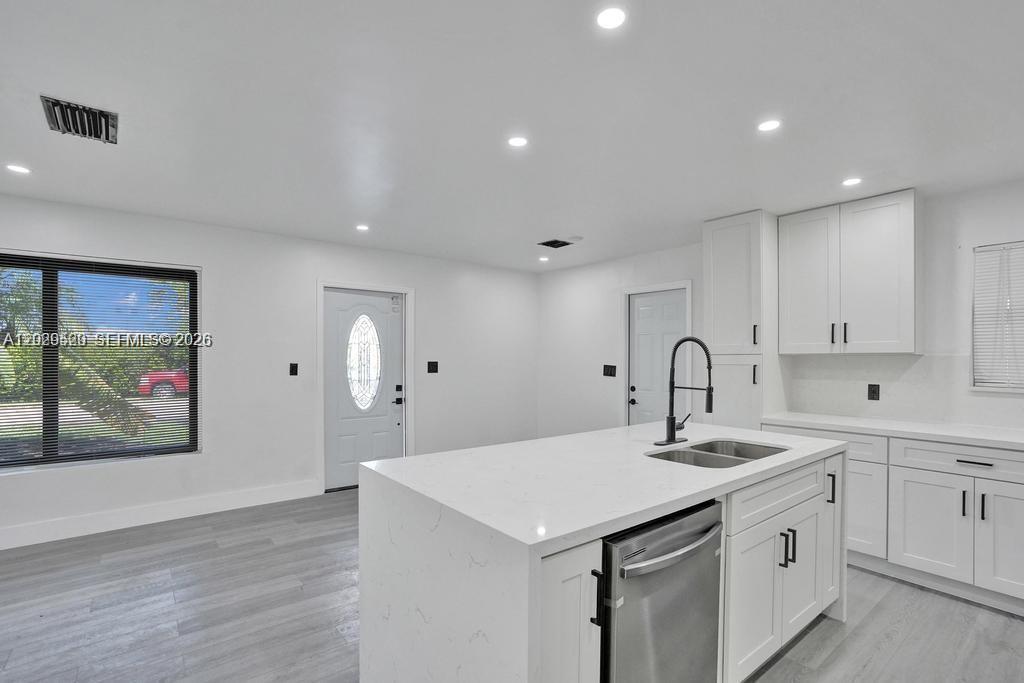 View photos, virtual tours, details... 1628 NE 7th Ave