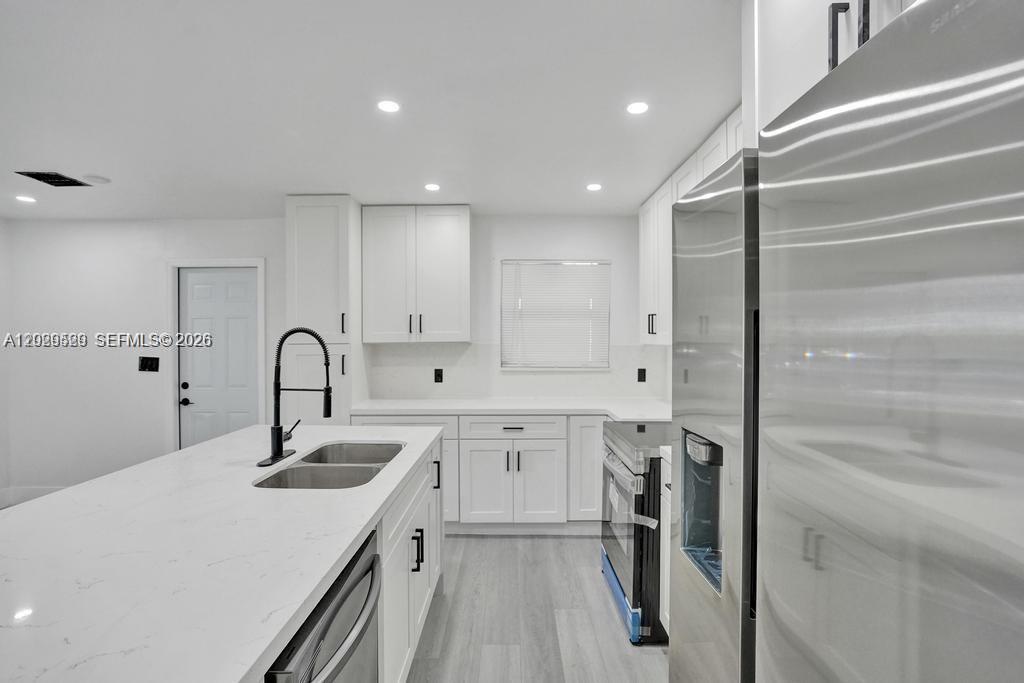 View photos, virtual tours, details... 1628 NE 7th Ave