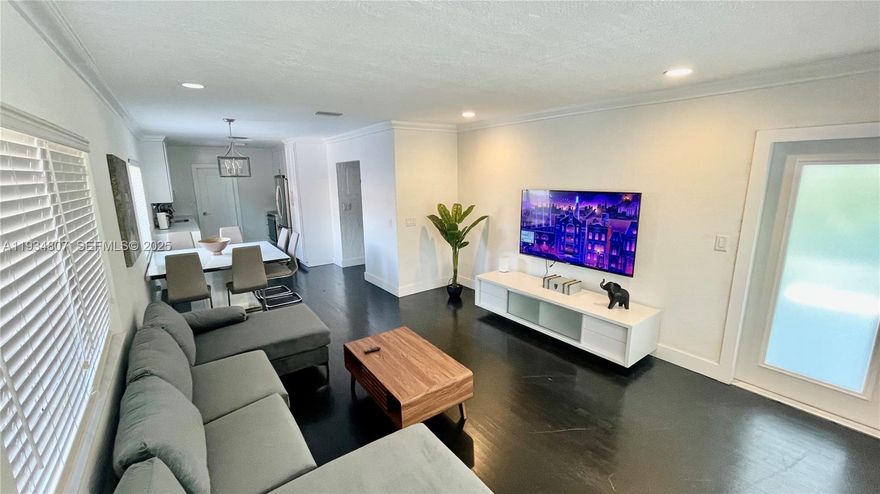 PRICED TO SELL! Fully permitted, remodeled home offered fully furnished, featuring a sundeck, spacious backyard, and driveway parking for up to 4 cars (2 front, 2 back). Ideal investment for short-term vacation rental or a perfect family home. Prime location just blocks from bars, restaurants, and shops on Hollywood Blvd, and minutes from Hollywood Beach.