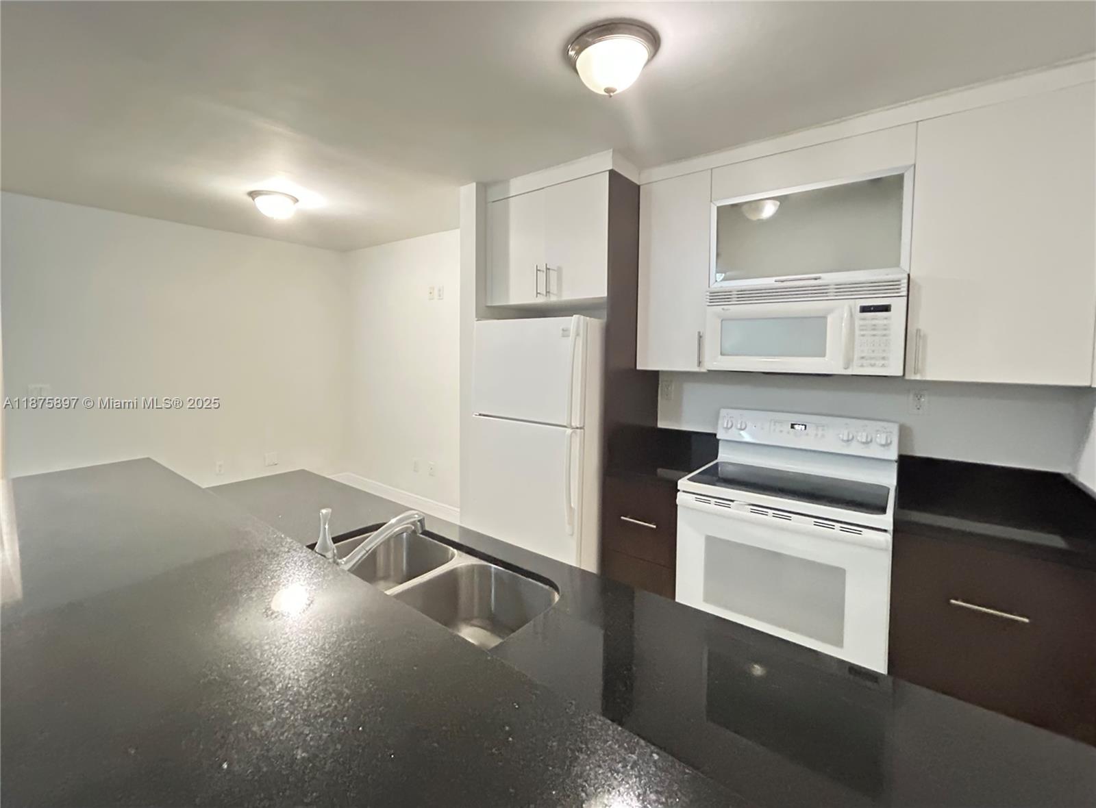 Residential rental unit centrally located half-block from Flamingo Park and only steps to Whole Foods, the Publix, Just a few blocks to sandy beaches, Shops of Fifth Street and Lincoln Rd. Enjoy this unit with wood kitchen, granite counters tops, private In-unit Washer & Dryer porcelain floors Throughout unit, and modern art deco design, Quiet & established neighborhood in the historic district. **** SAME DAY APPROVAL **** $27.00 APPLICATION FEE ****