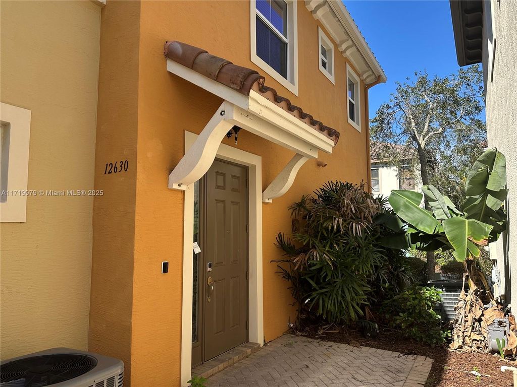 Photo of 12630 NW 32nd Ct, Sunrise, FL 33323 (MLS # A11719979)