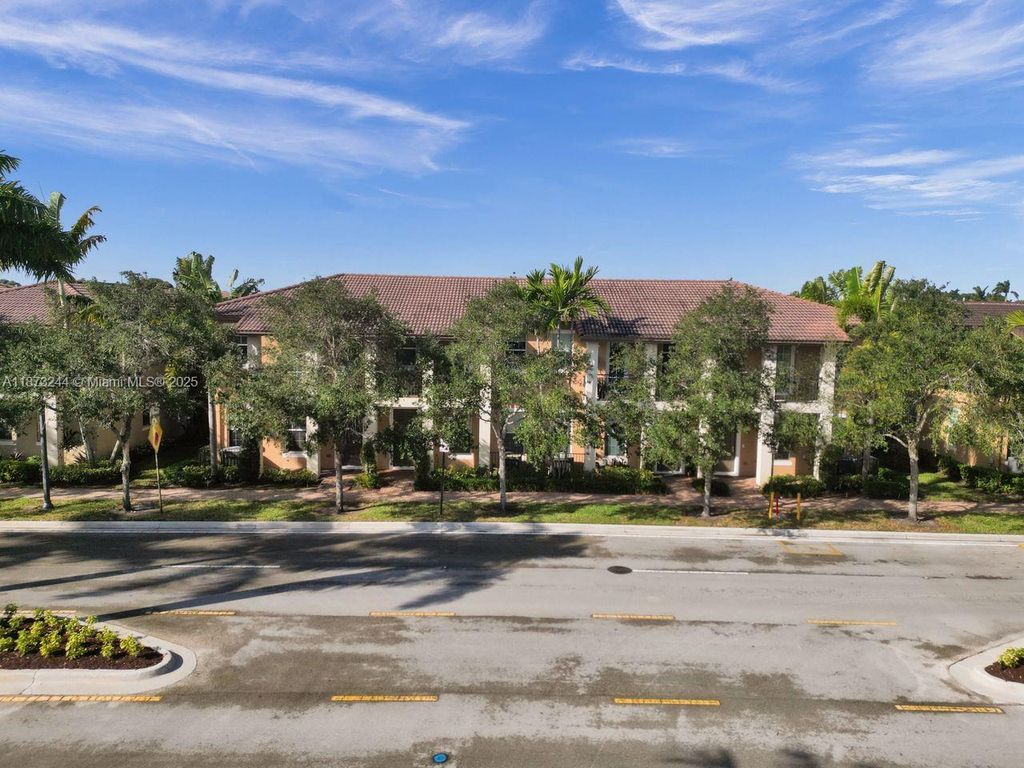 Photo of 1404 SW 147th Ave, Pembroke Pines, FL 33027 (MLS # A11873244)