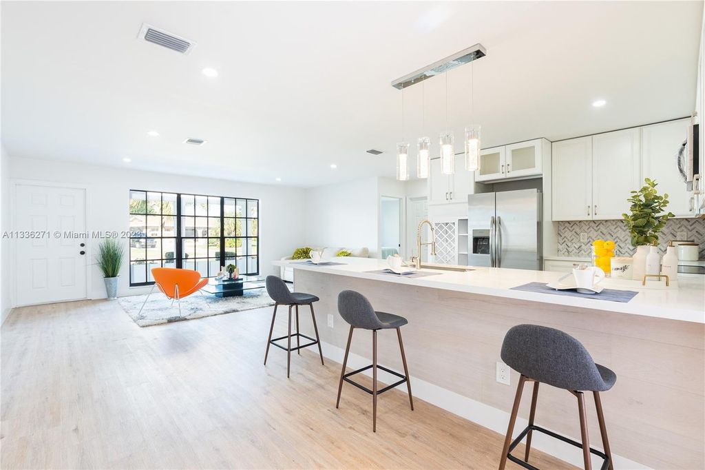 Photo of 1410 SE San Ignacio Ln, Port Saint Lucie, FL 34952 (MLS # A11336271)