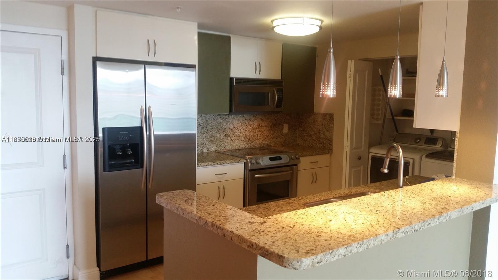 Beautiful Tower Suite Level residence with only 6 apartments per floor. This unit is a 2 bedroom 2 bathroom split floor plan apartment with an East view of Brickell, Downtown Miami and the Bay. Unit has laminate wood floors, remodeled kitchen, updated appliances, balcony, Washer and Dryer in unit. Walking distance to all the best that Brickell has to offer. Fiber internet included.
