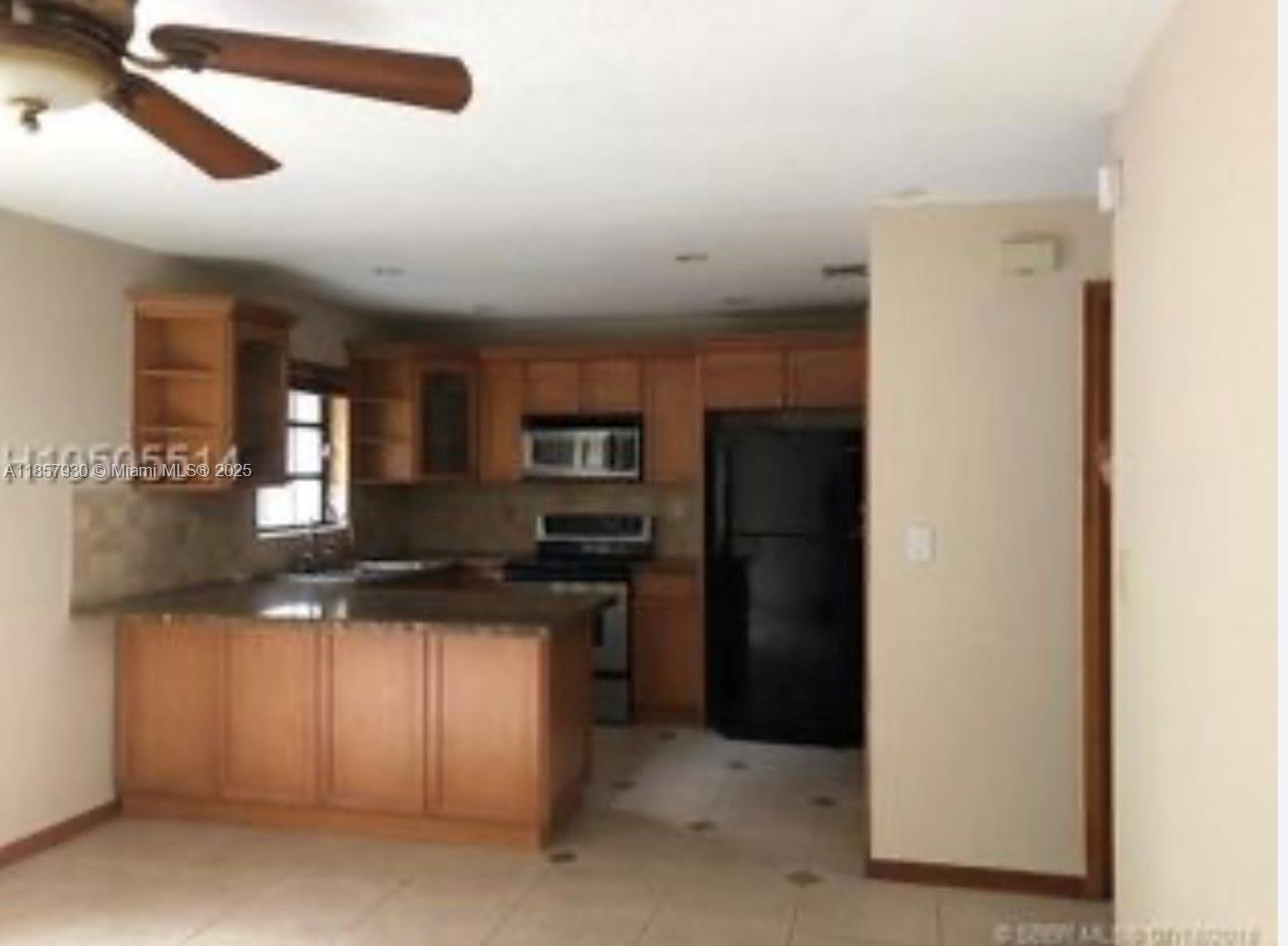 Excellent Community! Bright and open and Spacious Townhouse in great condition. Two story, tile throughout with back patio. Great distribution 3 Bed, 2 1/2 bath. Master bedroom has a balcony. Family oriented community with community pool for your enjoyment and relaxation. Two assigned parking spaces, easy highway access centrally located to highway I-75, Palmetto expressway and turnpike. CALL alt phone in Brokers Remarks. This property is (As IS)