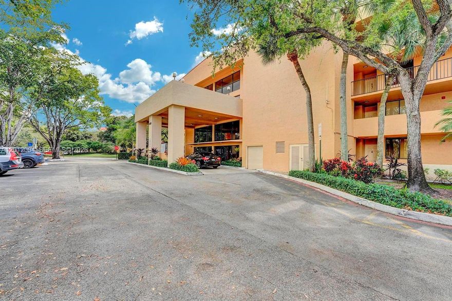 Welcome to the peaceful community of JACARANDA HEIGHTS in the heart of Plantation. This spacious condo offers over 1,000 sq ft of comfortable living, featuring a split layout with tile and laminate flooring throughout with ample natural light. 2 Generous Bedrooms with closets. 2 Full Bathrooms. Large, screened balcony perfect for relaxing with serene garden and lake views.  Washer and Dryer located conveniently in unit. Community has a Relaxing Clubhouse with Community Pool Well maintained common areas. Unbeatable Location Situated on Sunrise Blvd, nestled between Pine Island Rd and University Dr. You are minutes away from Plantation Walk, Broward Mall, endless dining, top rated schools, and parks. Easy access to major expressways (I-595/Turnpike). Perfect for First time homebuyers, downsizers, or a second home in sunny South Florida. Priced to Sell, Contact your broker today!
