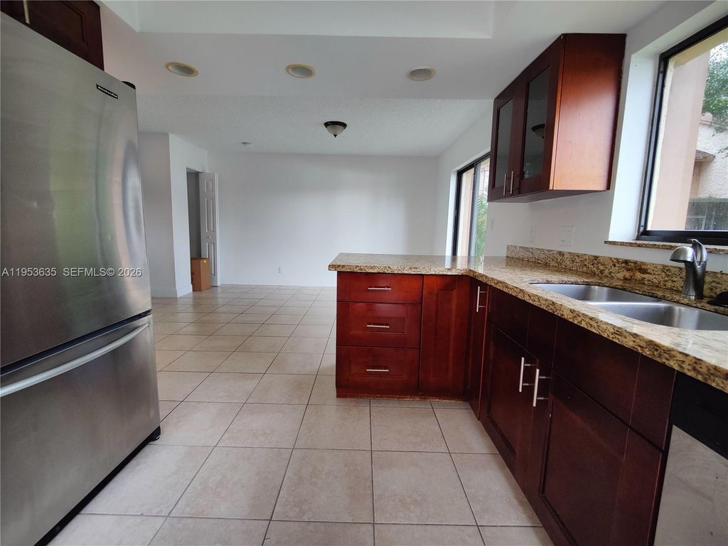 Photo of 181 Wimbledon Lake Dr #181, Plantation, FL 33324 (MLS # A11953635)