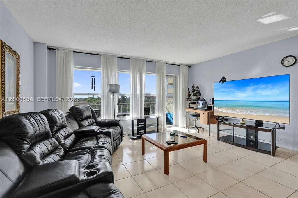 Photo of 10777 W Sample Rd #616, Coral Springs, FL 33065 (MLS # A12109350)