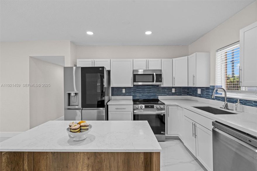 Seller helping Buyer with Closing. Don't miss your opportunity. Come see this Beautifully remodeled 3BR/2BA single-family home offering bright, modern living in a convenient location. Step into an open layout filled with natural light, connecting the living area to a brand-new kitchen featuring an eat-in island, pantry, sleek cabinetry, and new appliances. A separate dining area makes everyday living and entertaining effortless.

The primary suite includes an updated bathroom, while the refreshed second bath is spacious and stylish. Home features also include new full-size washer and dryer, impact windows and door, security system with cameras, and a storage closet.

Enjoy a large backyard perfect for relaxing or outdoor gatherings. Parking includes a covered carport plus extended driveway. Internet and landscaping are included for added convenience.

Located on a quiet residential street with quick access to shopping, dining, schools, and major routes. Easy to show and available for a quick move-in. 

Seller is also open to considering rental lease-option-to-buy offers. This fully updated home delivers comfort, style, and value—schedule your tour today.