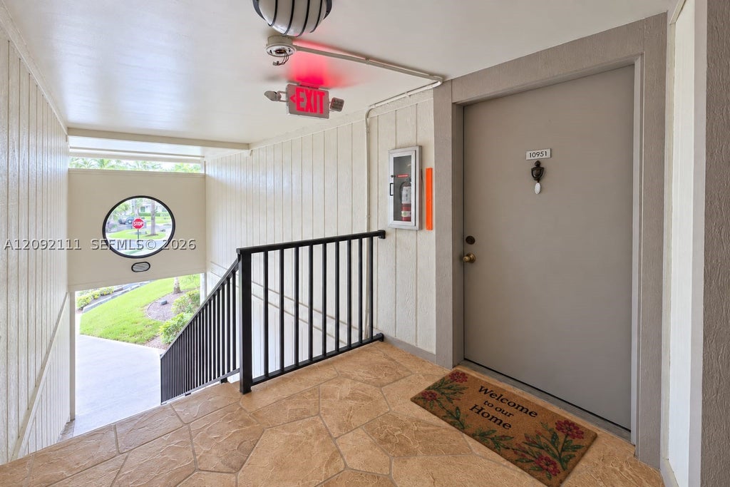 Photo of 10951 W Clairmont Cir #209, Tamarac, FL 33321 (MLS # A12092111)