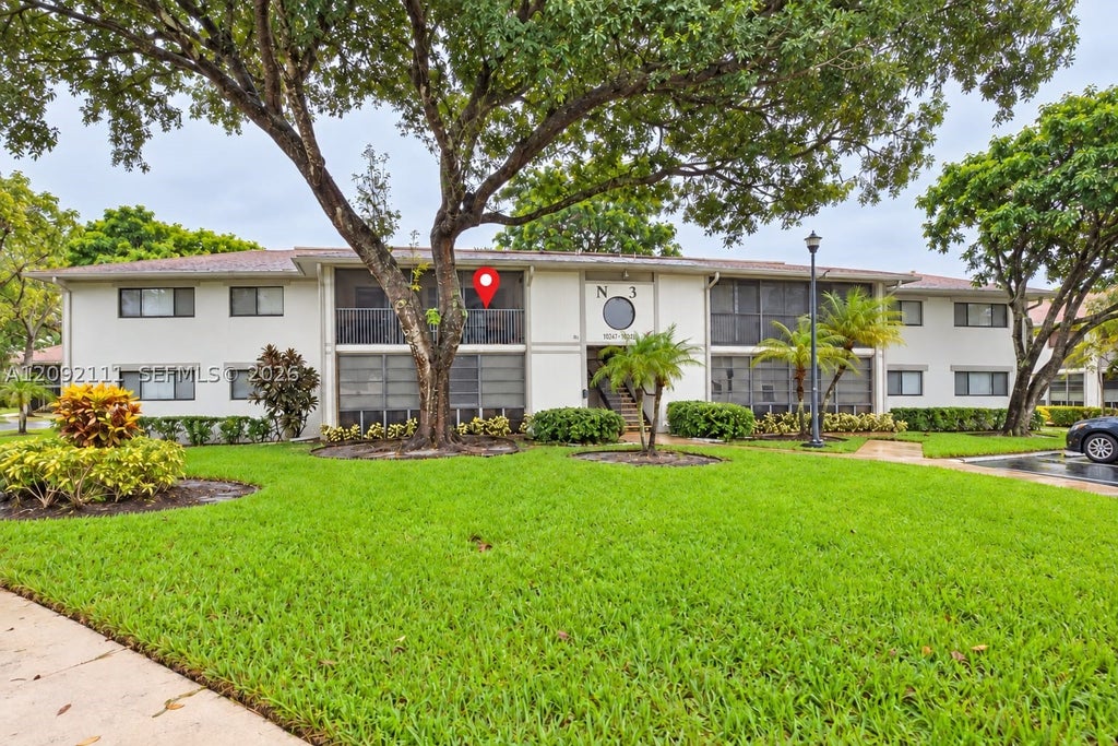 Photo of 10951 W Clairmont Cir #209, Tamarac, FL 33321 (MLS # A12092111)
