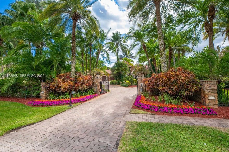 Mediterranean Elegance Meets Old-World Charm in Landmark Ranch Estates. A rare gem in South Florida’s premier gated enclave, home to just 44 custom estates and a discreet roster of celebrity neighbors. Set on 2.3 acres of lush, resort-style grounds, this Mediterranean-inspired masterpiece offers timeless sophistication and exceptional privacy. From the moment you arrive, old-world charm surrounds you—custom millwork, warm finishes, and rich architectural details reminiscent of a European villa.The expansive layout features 6 bedrooms plus an office/den, 7 bathrooms, and private maid’s quarters, providing both luxury and versatility. Designed for effortless entertaining, the home includes a billiard and bar lounge, a fully equipped outdoor kitchen, and multiple indoor/outdoor gathering spaces. Step outside and unwind by the heated pool, enjoy the serenity of the landscaped grounds, or perfect your swing on your private putting green. This exceptional estate offers more than a home, it offers a lifestyle defined by elegance, comfort, and exclusivity. All it needs is YOU.