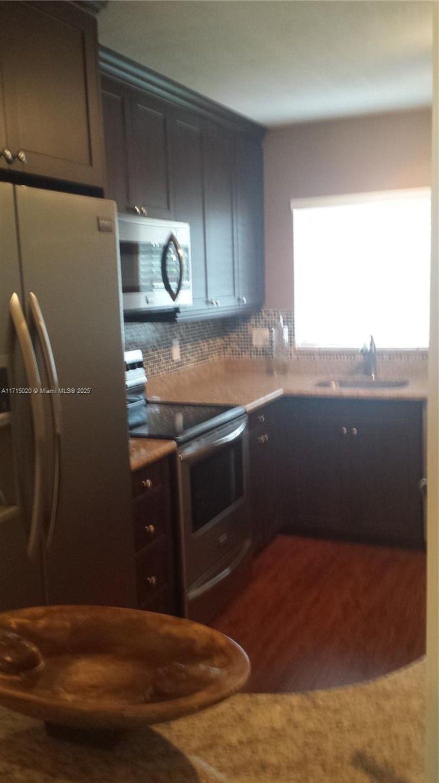 Welcome to this spacious 975 sq. ft. condo located on the serene South Fork of the Middle River in Wilton Manors. Stunning waterfront views right from your private balcony, offering a peaceful retreat with easy access to the river for kayaking, boating, or simply enjoying nature. The kitchen is equipped with modern appliances, ample cabinetry, that flows in living and dining areas. The master suite includes an ensuite bathroom, while the second bedroom and bathroom are perfect for guests or home office use. Additional features include in-unit laundry, assigned parking, and access to community amenities such as a pool and dock. With a prime location near dining, shopping, and Wilton Manors’ vibrant nightlife, this condo offers a perfect balance of comfort, convenience, and scenic beauty.