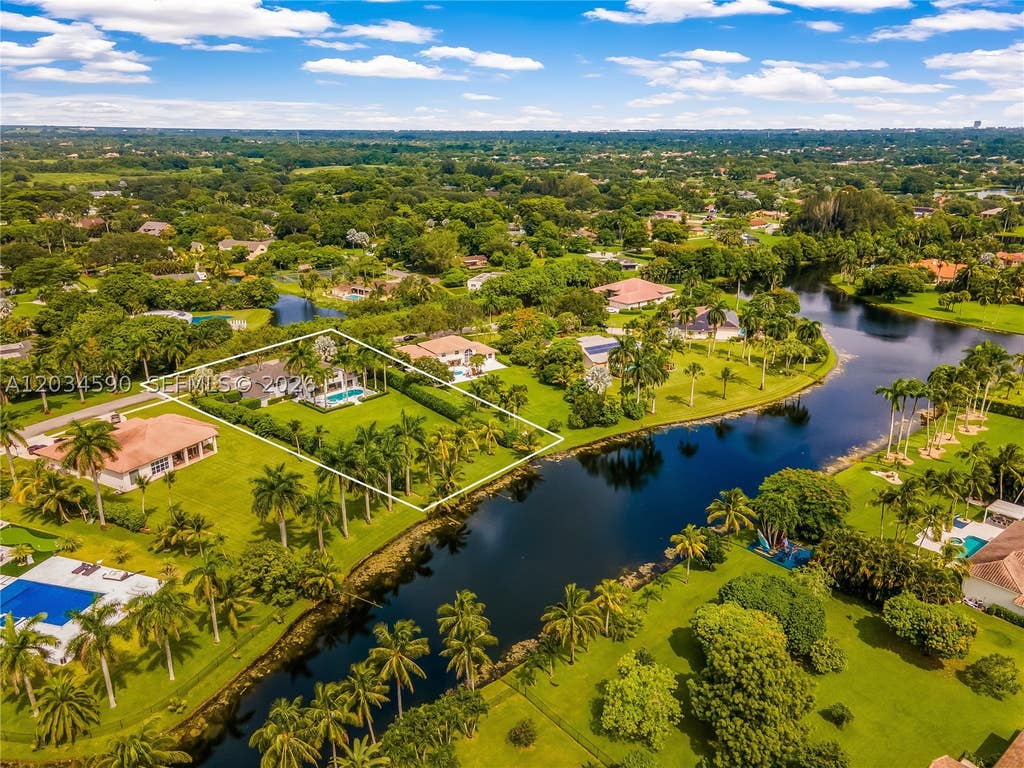 Photo of 4242 SW 107th Way, Davie, FL 33328 (MLS # A12034590)