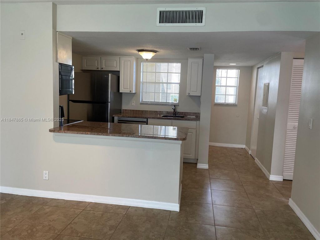 Photo of 6323 La Costa Dr #A, Boca Raton, FL 33433 (MLS # A11847865)