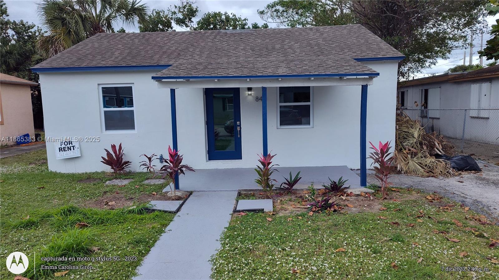COZY FULLY REMODELED HOME!! 2 Bedrooms, 1 bathroom, WATER INCLUDED. The house has impact windows, an upgraded kitchen with granite countertops and steel stainless appliances and new cabinets, the entire house has LED lights, driveway for 3 cars and a nice porch and front yard, OK pets with $350 pet security deposit non- refundable. Location Enjoy the benefit of being a short drive away from the beach, Restaurants & City Place. QUICK and FLEXIBLE Approval.