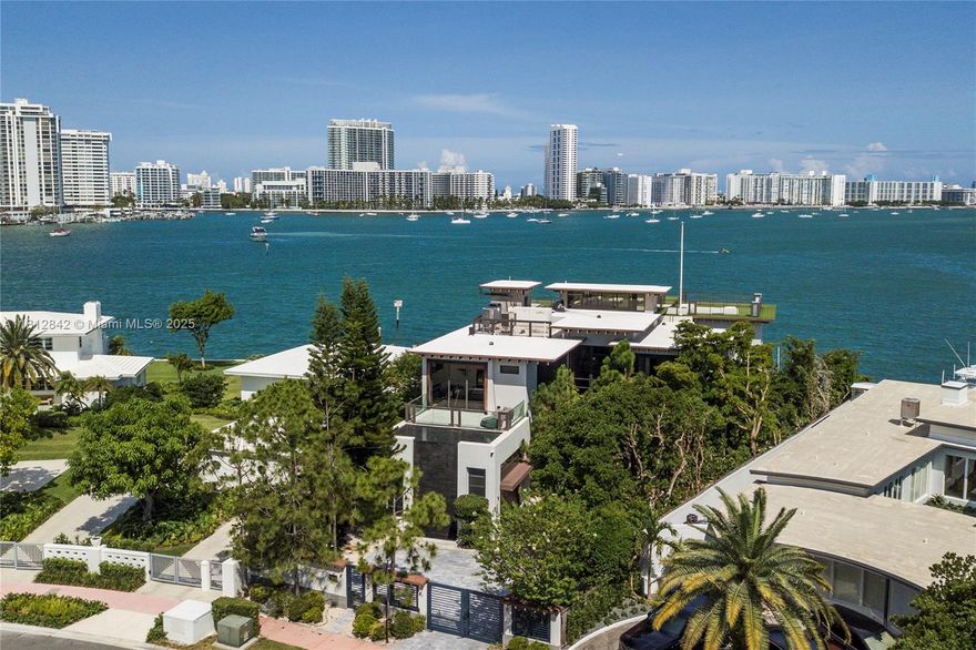 A masterpiece, this Venetian Islands estate offers 100 ft of prime waterfront with nice views of Downtown Miami and South Beach. The 9,347 SF home showcases curated interiors with Artefacto furnishings, lush landscaping, a koi pond, zero-edge pool with hot tub, and rooftop terrace with sunset views. Designed for effortless indoor-outdoor living, there is a chef’s kitchen, wine cellar, fire pits, elevator, and 7 bedrooms. The primary suite is a tranquil retreat with a spa-style bath and custom Ornare closets. Additional highlights include an outdoor kitchen with pizza oven, 2-car garage, private gated entry, integrated smart home features, and close proximity to the shops, gyms, and restaurants of Sunset Harbour. Rental can be annual or seasonal, price might change depending of the month.