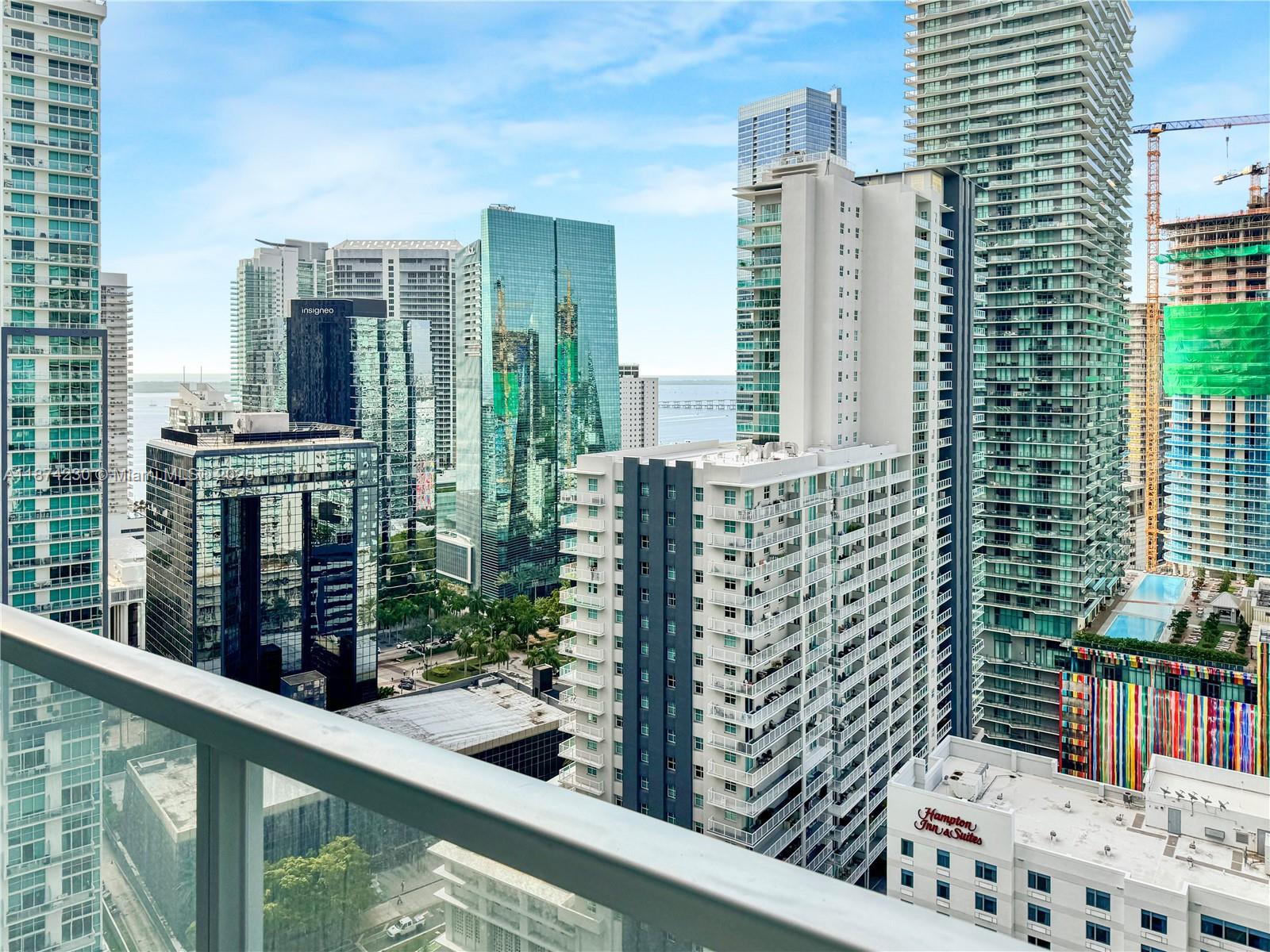 Fully furnished 2 bed / 2 bath at Axis Brickell with floor-to-ceiling windows, open layout, and wraparound balcony with city & bay views. Modern kitchen with granite counters, stainless steel appliances, and island seating. Spacious bedrooms with ample closets and spa-style baths. Turnkey with designer furniture and décor. Enjoy resort-style amenities: 2 pools, fitness center, clubroom, business center, 24-hr concierge & valet. Prime location across from Brickell City Centre, steps to dining, shopping & metro