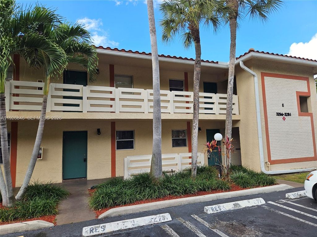 Photo of 3272 NW 102nd Ter #104-E, Coral Springs, FL 33065 (MLS # A11926846)