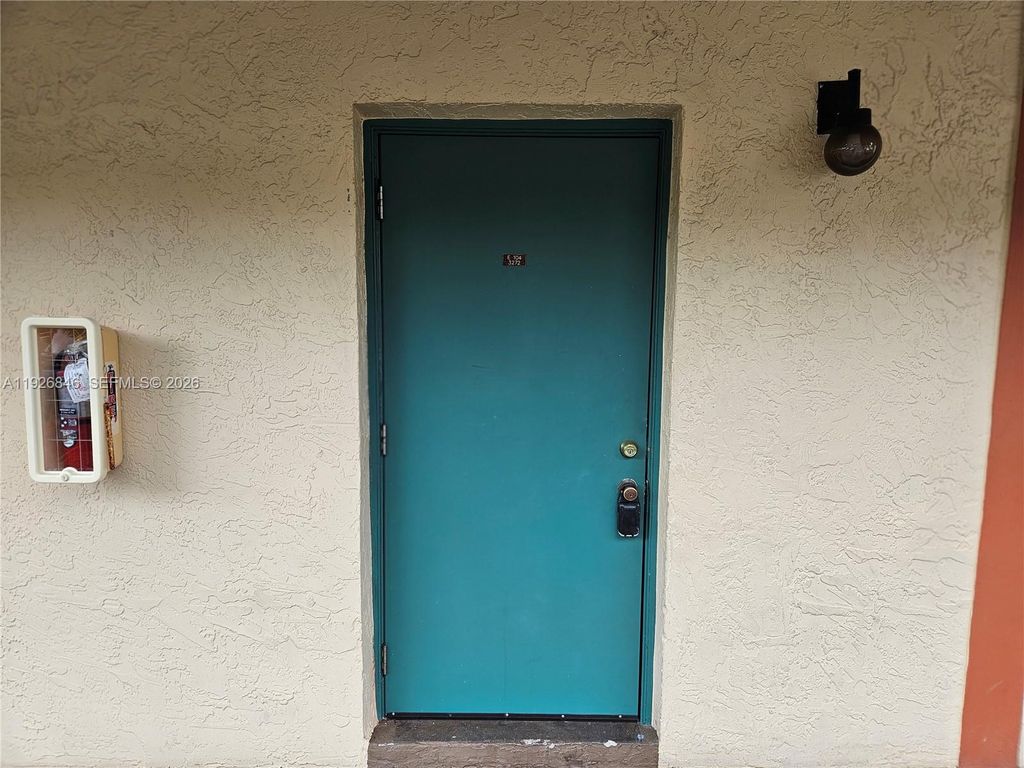 Photo of 3272 NW 102nd Ter #104-E, Coral Springs, FL 33065 (MLS # A11926846)