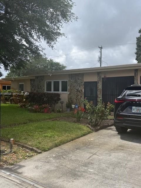 Photo of 16300 NW 21st Ave, Miami Gardens, FL 33054 (MLS # A11995328)