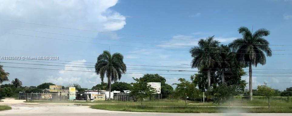 Make this almost 5 acre piece of land yours, one of the most traveled roads in the state Krome Ave.