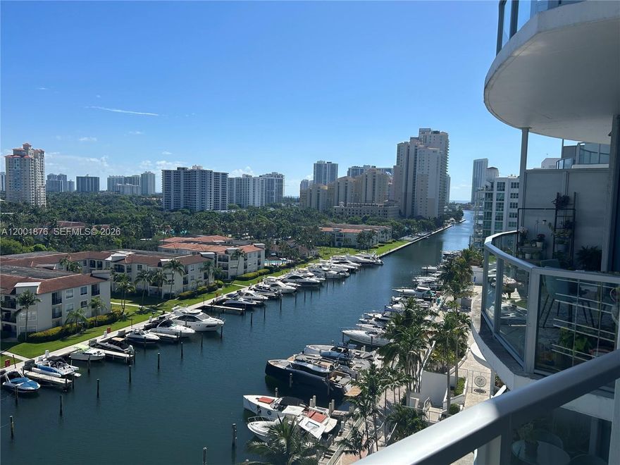 Experience luxury living in the heart of Aventura! This stunning 2-bedroom + den residence features a spacious open floor plan, soaring 11-foot ceilings, and floor-to-ceiling windows showcasing breathtaking water views. Step onto your private terrace and enjoy the serene surroundings. Interior highlights include wood flooring, elegant kitchen cabinetry, stainless steel appliances, and granite countertops. The building offers resort-style amenities, including a heated pool, jacuzzi, sauna, fitness center, steam room, massage rooms, tennis and basketball courts, children’s playground, and a private marina. Ideally located near Aventura Recreation Center, Peace Park, Aventura School, shopping, dining, and major attractions.