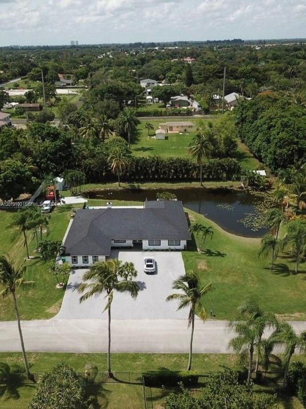 Photo of 11701 SW 21st Ct, Davie, FL 33325 (MLS # A12019100)