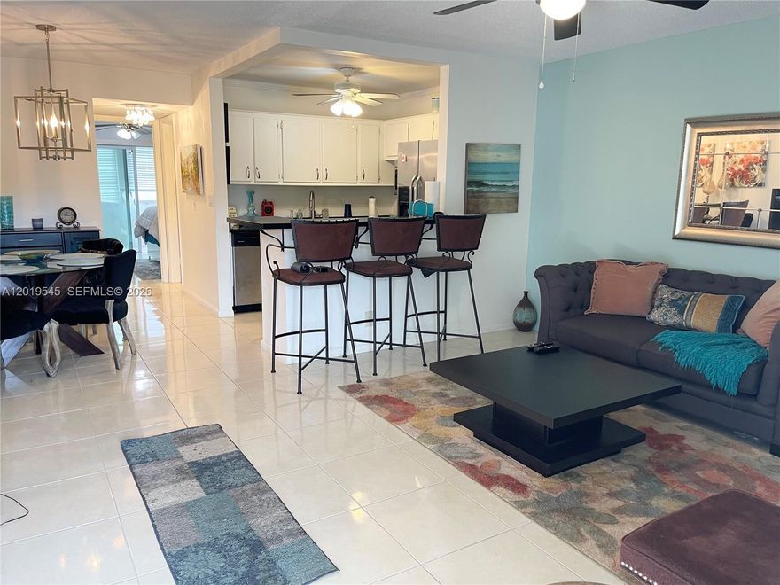 Beautiful 1-bedroom, 1-bath condo in the desirable 55+ community of Century Village featuring ceramic tile floors, granite countertops, stainless steel appliances, and newer A/C unit installed. Residents enjoy resort-style amenities including a 92,000 sq. ft. clubhouse with theater, fitness center, library, billiards, activity rooms, indoor pool, sauna, on-site medical center and more. Outdoor amenities include multiple pools, tennis, pickleball, shuffleboard, bocce ball, sailing, and kayaking. Free community buses provide transportation to shopping, restaurants, and medical facilities. Gated community with 24-hour security, conveniently located near the Florida Turnpike, I-95, and Palm Beach International Airport.