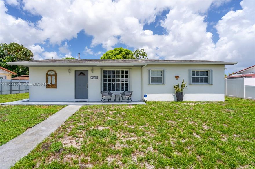 Beautifully renovated 3-bedroom home in Miami Gardens filled with natural light! Features updated kitchen with modern appliances, new waterproof LVP flooring, spacious family room, and covered terrace ideal for entertaining. Enjoy a fully fenced yard with electric gate, hot tub, full outdoor kitchen, shed, and lush mango and avocado trees. Includes a versatile workshop with private entrance—great for storage or conversion to in-law suite or income-producing efficiency. Prime location near Hard Rock Stadium, Calder Casino, recreational center, major highways, and shopping. A must-see packed with upgrades and charm!