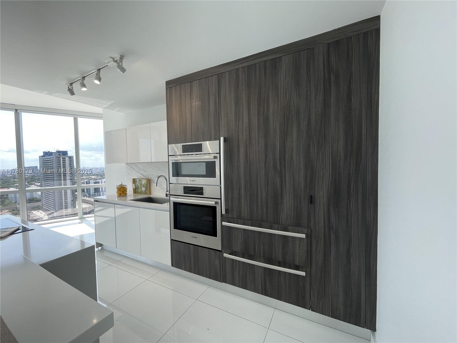 View photos, virtual tours, details... 851 NE 1st Ave 2004