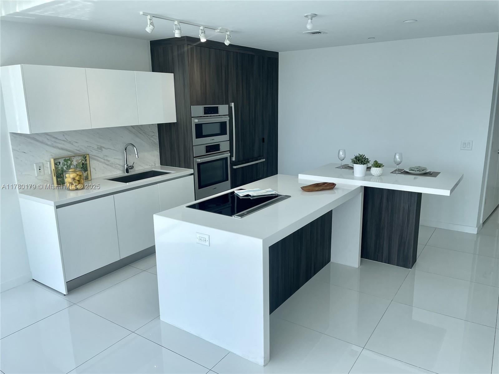 View photos, virtual tours, details... 851 NE 1st Ave 2004