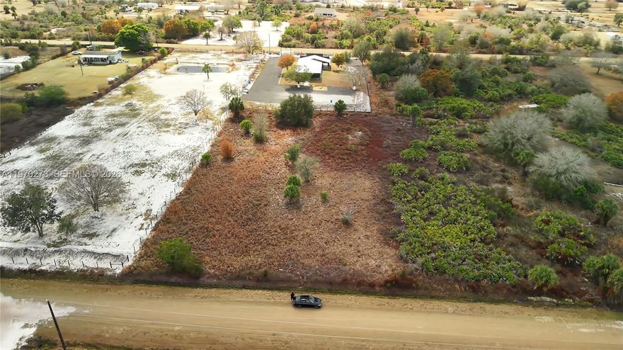Spacious 1.25-acre vacant lot located in Okeechobee, FL. Enjoy peaceful country living with plenty of room to build your dream home, place a mobile/manufactured home, or invest for the future. This oversized parcel offers privacy, open space, and flexibility with no HOA restrictions. Ideal for those seeking a rural lifestyle while still within a reasonable distance to town, shopping, and schools.