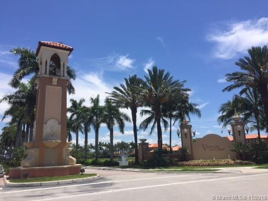 Enjoy this spacious 3 bedroom, 2-1/2 bath, 1-car garage townhome in the gated community of Venetian Isles. First level is freshly painted and completely tiled with tray ceilings in the living-dining area and a large kitchen open to the family room. The family room includes a powder room and direct access to a paved patio with lake views. Upstairs you will enjoy new wood floors and fresh paint throughout. The large master bedroom features a well-equipped walk-in closet and bathroom with a roman tub and separate shower. Two other bedrooms, an additional bathroom, and an ample laundry room with new washer/dryer complete the second level.  Venetian Isles includes a community pool, volleyball courts, roving security, fitness trail, and playground. Rental comes with courtesy alarm monitoring!