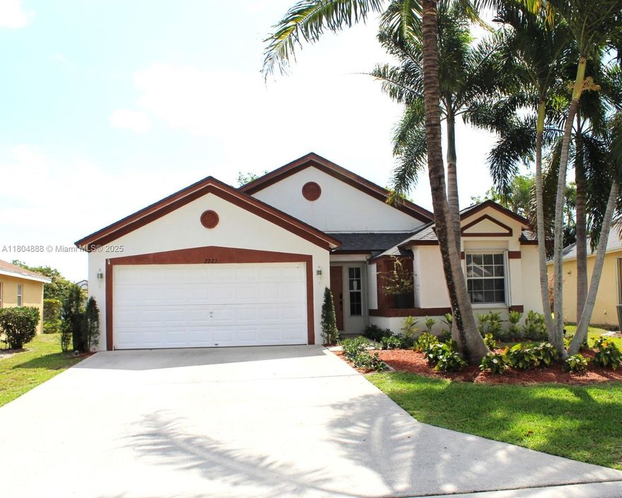 Completely renovated 3-bedroom, 2-bathroom waterfront home with 1,452 sq ft in a quiet, 24-hour gated community. The renovation was completed less than 12 months ago and features state-of-the-art appliances, modern finishes, and an open-concept layout ideal for both relaxing and entertaining. Enjoy peaceful water views from the backyard, creating a serene and private atmosphere.

The home is conveniently located just steps from Publix and Okeeheelee Park, which features an 18-hole golf course, walking trails, water sports, Additional highlights include Samsung Bespoke appliances, in-unit washer and dryer, garage and driveway parking, close to shopping, dining, and major highways, this home offers the perfect blend of comfort.

Turnkey and move-in ready—schedule your showing today!