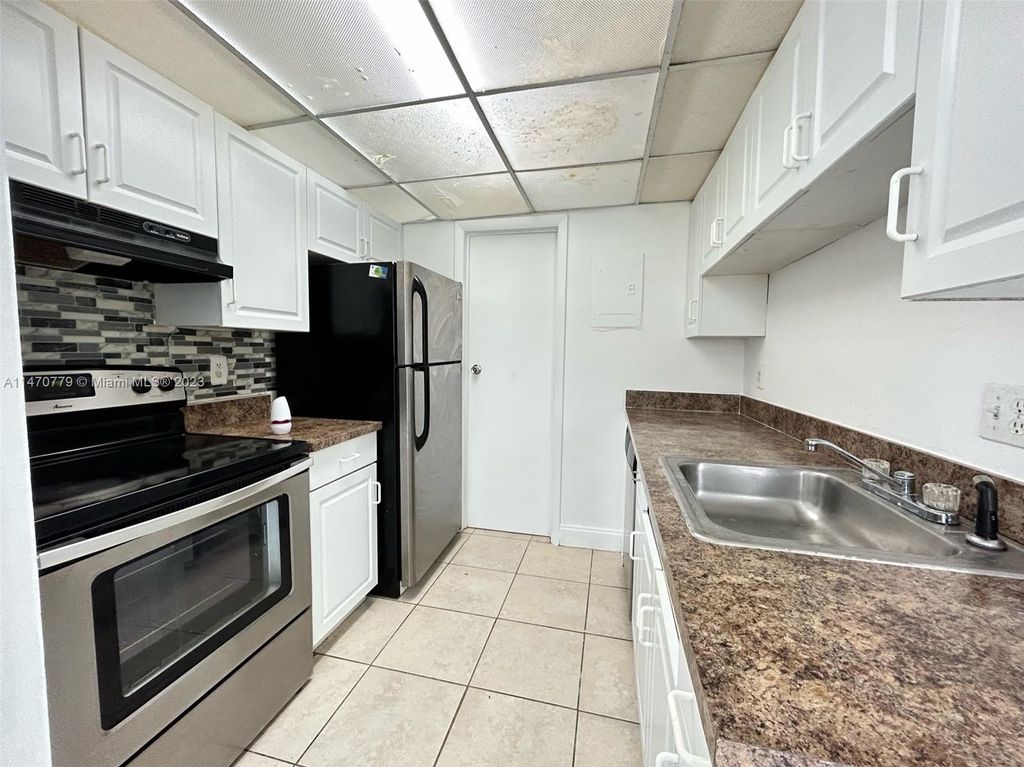 Photo of 6603 Winfield Blvd #B1, Margate, FL 33063 (MLS # A11470779)