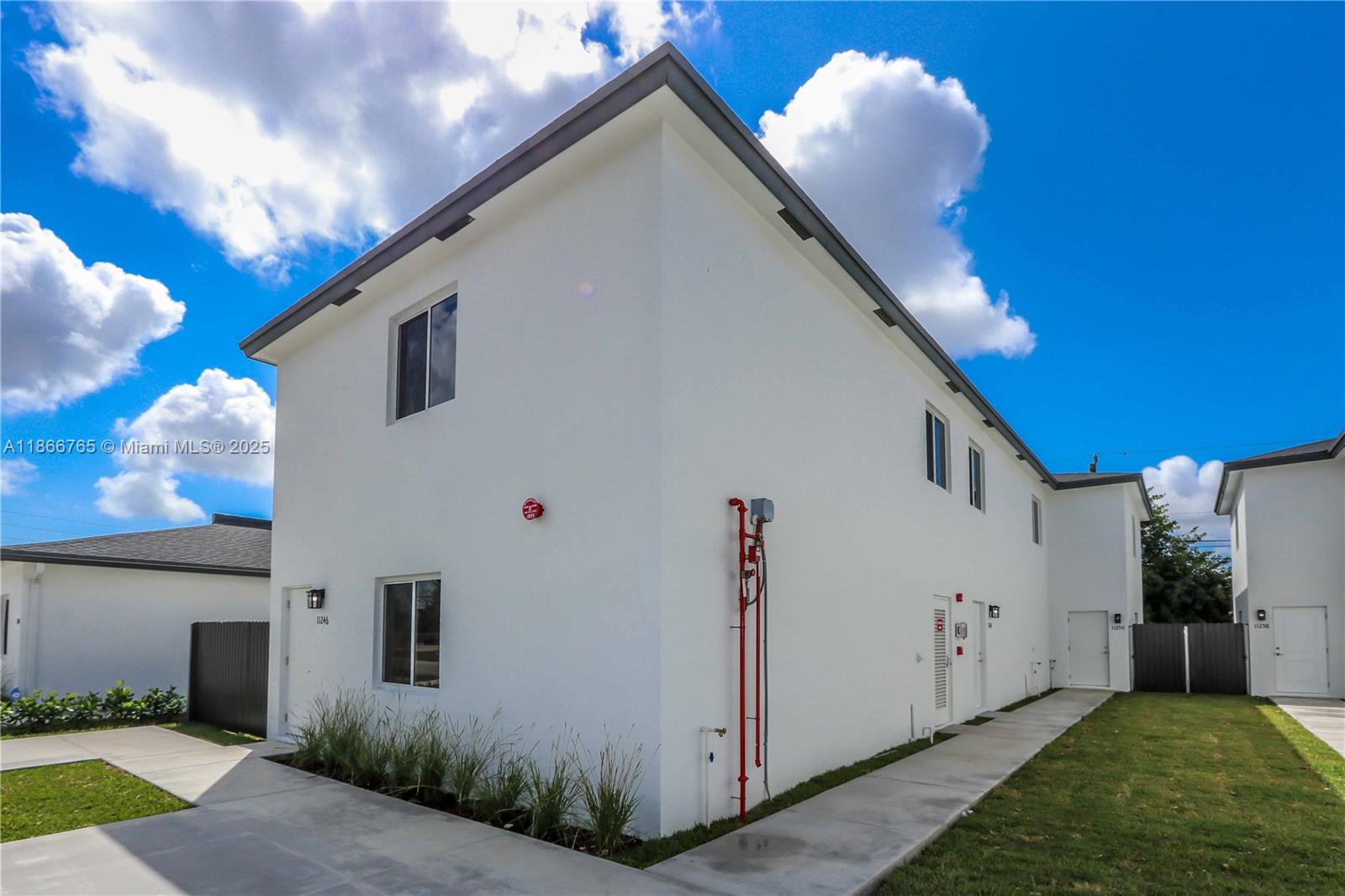 Come find the newly built Gabriela Estates located near Cutler Bay with easy access to the Florida Turnpike and US-1. 11246 SW 187th Street is a new construction triplex that consists of 100%, 3-Bed/2.5-Bath units. Each unit comes with 2 parking spaces. Modern kitchens with quartz countertops and stainless steel appliances. Every unit has a washer/dryer, central air, fire sprinkler system for safety, and a private yard. Every unit is individually metered for water. Tile floors throughout the first level and luxury vinyl plank floors throughout the stairs and second levels. No HOA or CDD fees. There are other 4 other triplexes also for sale by the same developer. Photos are representative of the property and finish level.