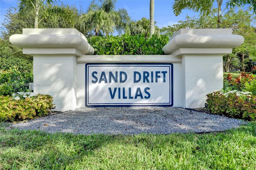 Stunning three-bedroom and two-and-a-half-bath townhome in the highly sought-after Sand Drift Villas of Breakers West! Cook in style in the kitchen with off-white cabinets, stainless steel appliances, eat-in area and wood-plank tile floors. Relax or entertain in the living and dining areas with soaring volume ceilings, wood-burning fireplace and built-in wall unit. Primary downstairs offers a walk-in closet plus two long closets, double vanities, makeup area, separate shower and tub. Upstairs, two generous bedrooms share a fully updated bath, and one bedroom features a rooftop deck. Step outside to the screened-in patio with sink, cabinets, and TV. Carpet throughout living, dining, and all bedrooms. Two-car garage and long driveway. Roof replaced 2023, A/C 2017 and maintained twice a year, water heater 2001, refrigerator 2 years old, washer 1 year old, all other kitchen appliances 2010. Live the luxurious lifestyle in this man-guard-gated community with optional club memberships which the amenites come with, just minutes away from West Palm Beach Airport, restaurants, entertainment, and 30 minutes to downtown West Palm Beach! Gated community – no signage permitted. GPS required.