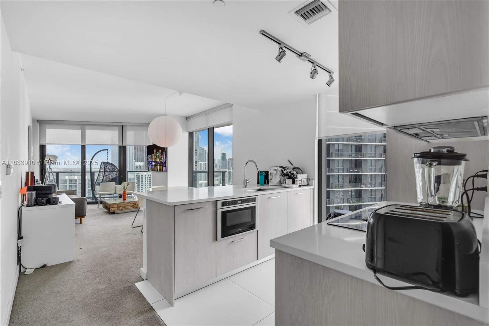 Set in Miami’s Paraiso District within the vibrant Edgewater neighborhood, Unit 2308 at Paraiso Bayviews offers the perfect blend of comfort and lifestyle. Completed in 2018, this modern high-rise features resort-style amenities including a panoramic rooftop pool, club room, children’s playroom, fitness center, business center, tennis courts, and more. The unit features a spacious 2-bedroom + den layout with a highly functional floor plan. The enclosed den can easily be used as a home office or converted into a third bedroom. Currently tenant-occupied through December 31st, 2025, this is a great opportunity for investors seeking immediate income. Some areas of the unit are carpeted, and while 24-hour notice is required, showings are simple to coordinate as tenants are flexible.