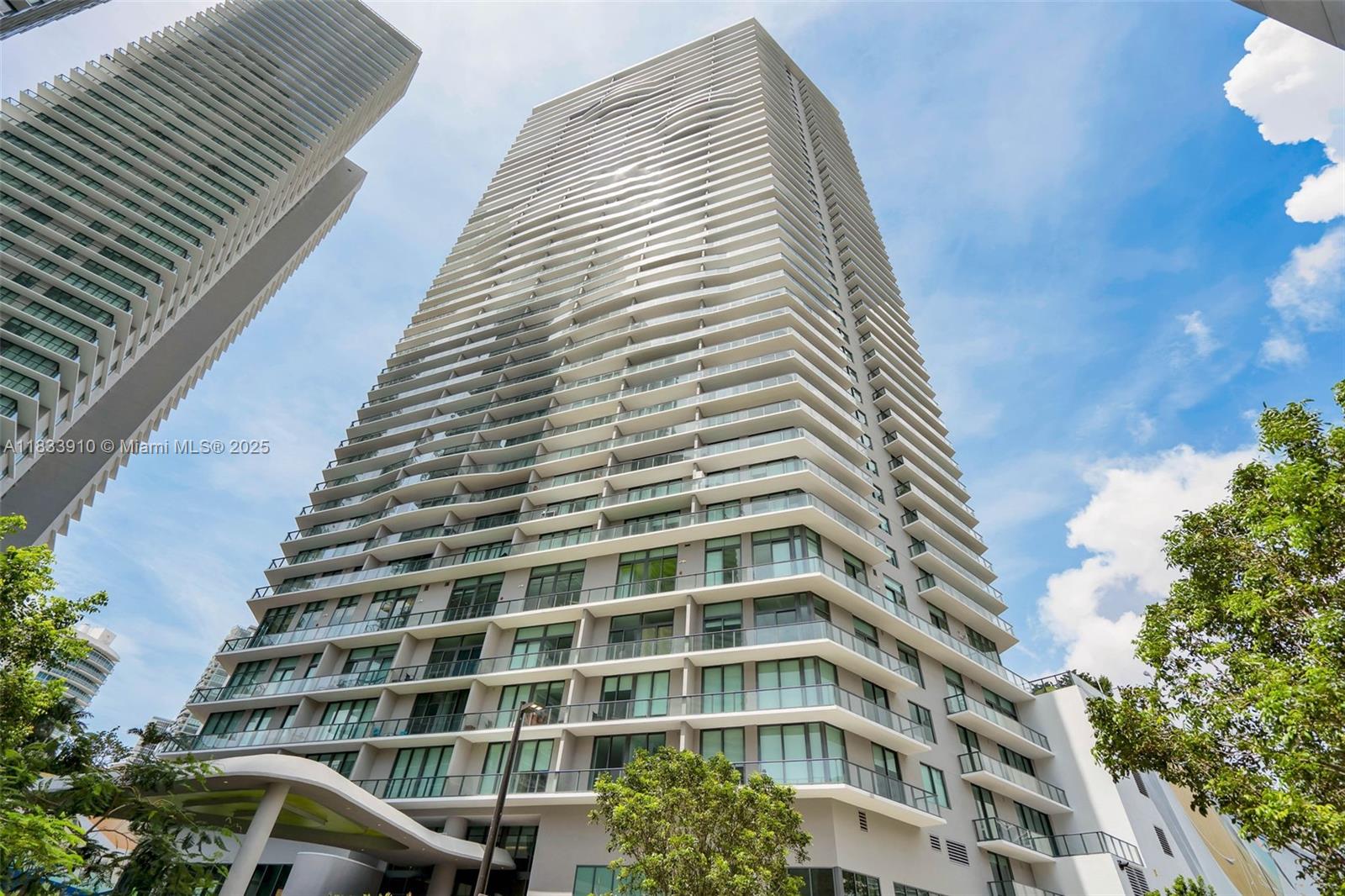Set in Miami’s Paraiso District within the vibrant Edgewater neighborhood, Unit 2308 at Paraiso Bayviews offers the perfect blend of comfort and lifestyle. Completed in 2018, this modern high-rise features resort-style amenities including a panoramic rooftop pool, club room, children’s playroom, fitness center, business center, tennis courts, and more. The unit features a spacious 2-bedroom + den layout with a highly functional floor plan. The enclosed den can easily be used as a home office or converted into a third bedroom. Currently tenant-occupied through December 31st, 2025, this is a great opportunity for investors seeking immediate income. Some areas of the unit are carpeted, and while 24-hour notice is required, showings are simple to coordinate as tenants are flexible.