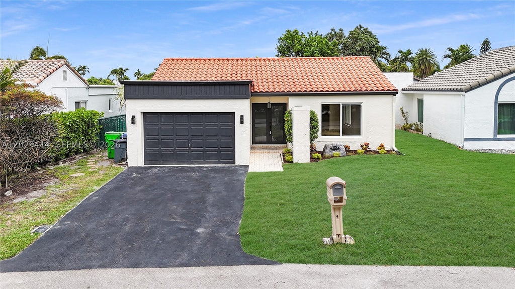 Photo of 9661 NW 44th Ct, Sunrise, FL 33351 (MLS # A12029414)